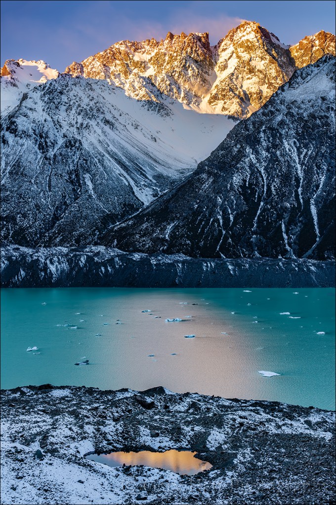 Reflection on the Rocks, Nun's Veil and Tasman Lake, New Zealand
